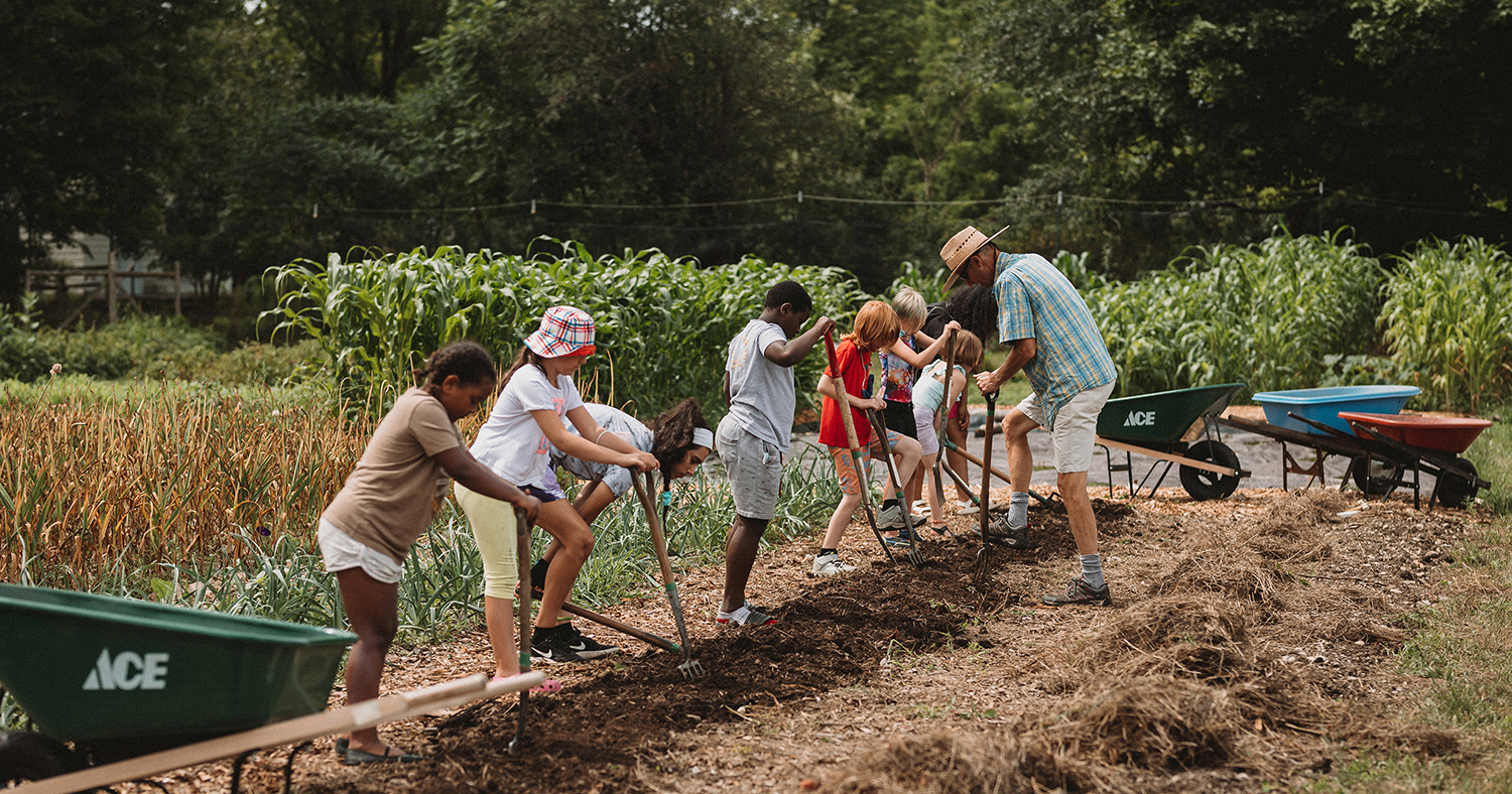 students preparing a garden bed at Hawthorne Valley's visiting students program